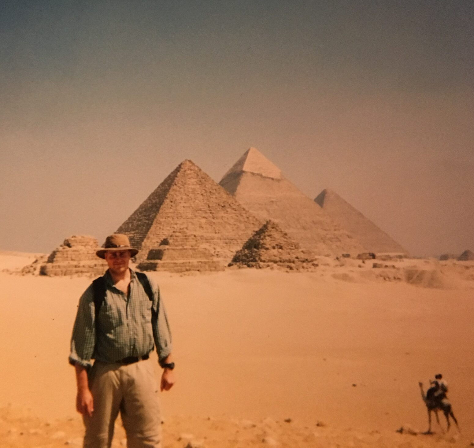 Jon Opdyke next to pyramids